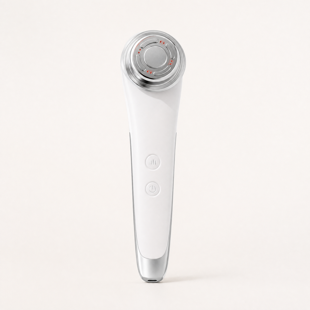 Tessora Facial Massager in white on a soft off-white background