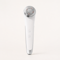 Tessora Facial Massager in white on a soft off-white background
